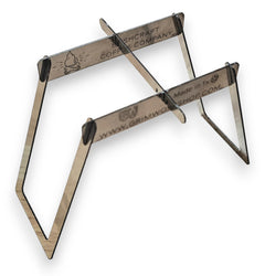 A stainless steel camping wood burning stove that burns multiple fuels. This micro wood stove can fit into a wallet, or altoids tin stove.