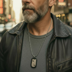 Dog tag escape tools showing handcuff key, shim, file, and  saw.