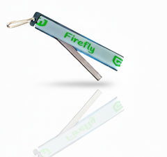 Firefly Heat fire starter tool shown on a keychain highlighting slim profile and compact size.