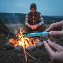 Firefly Heat fire starter tool shown on a keychain highlighting slim profile and compact size.