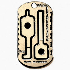 Emergency esacpe and evasion tools on a tactical necklace escape kit. 