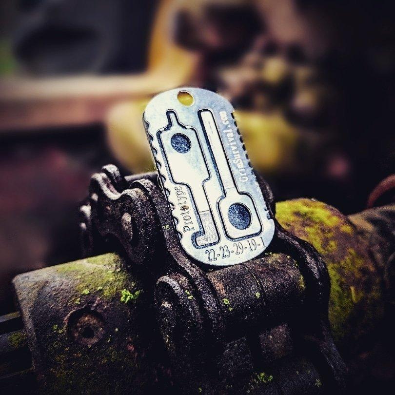 Emergency esacpe and evasion tools on a tactical necklace escape kit. 